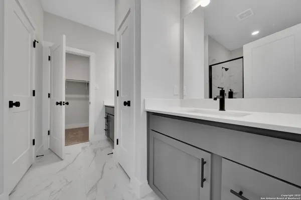 a view of an empty walk in closet