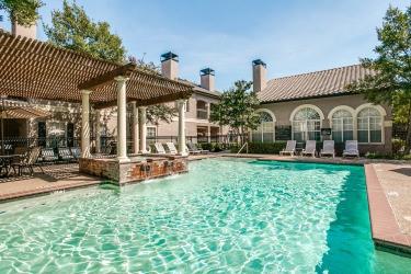 2601 Preston Road, Unit 6109 Plano, TX 75093 - Photo 15 of 16 a view of a house with backyard porch and sitting area