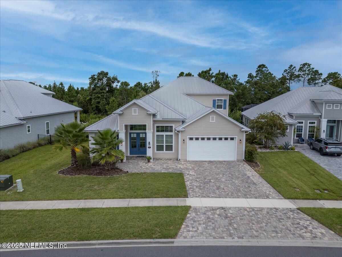 141 Topside Dr. St. Johns, FL 32259 - Photo 2 of 71 front view of a house with a yard
