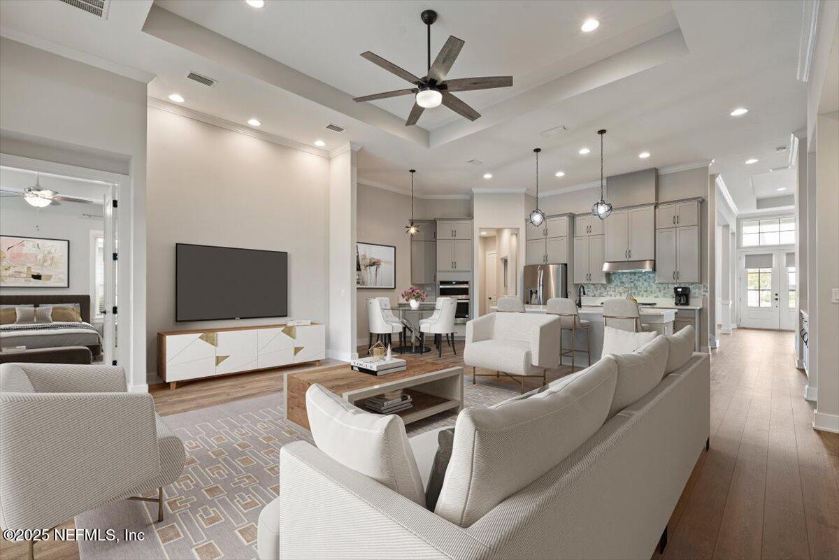 141 Topside Dr. St. Johns, FL 32259 - Photo 22 of 71 a living room with furniture and a flat screen tv
