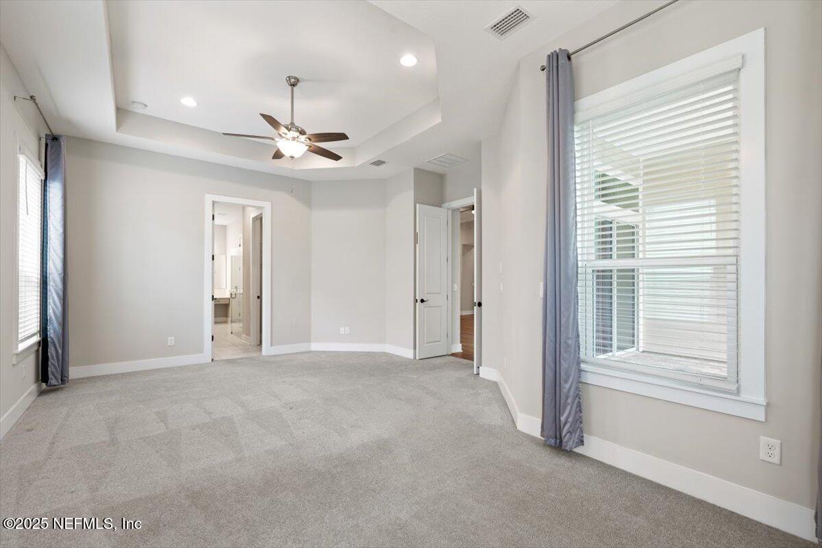 141 Topside Dr. St. Johns, FL 32259 - Photo 33 of 71 a view of a livingroom with a ceiling fan and window
