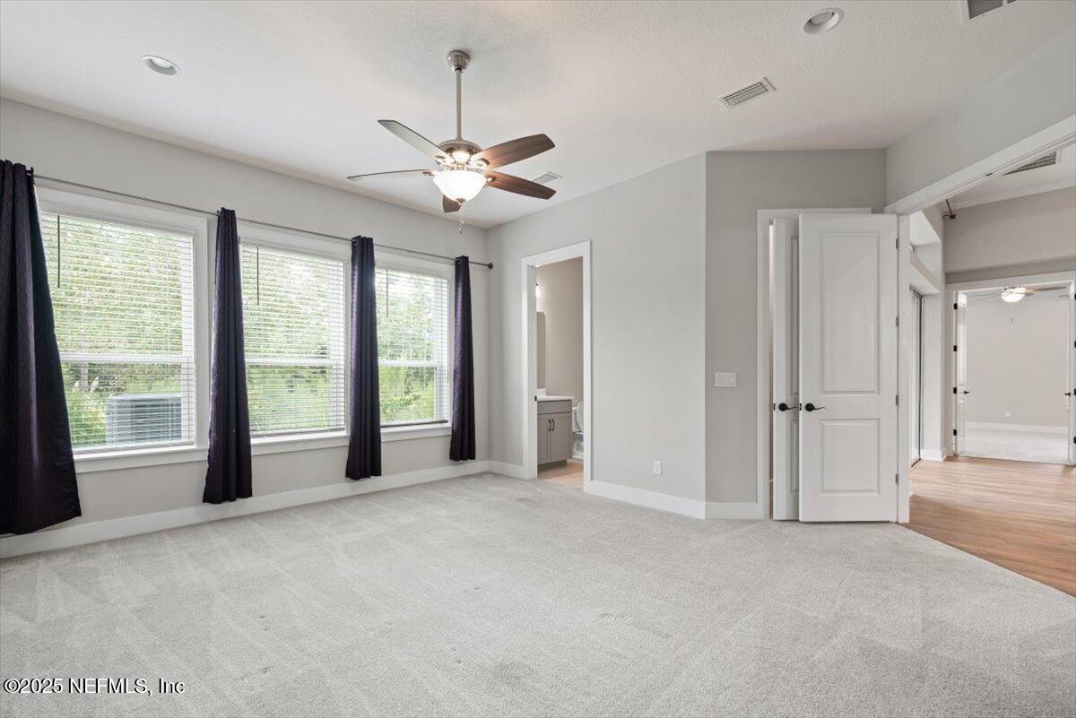 141 Topside Dr. St. Johns, FL 32259 - Photo 39 of 71 a view of an empty room with a window