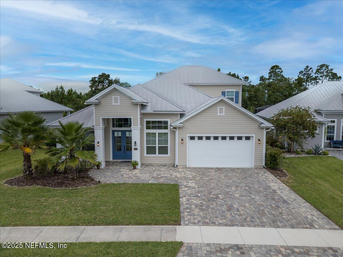 141 Topside Dr. St. Johns, FL 32259 - Photo 4 of 71 a view of a house with a yard and potted plants