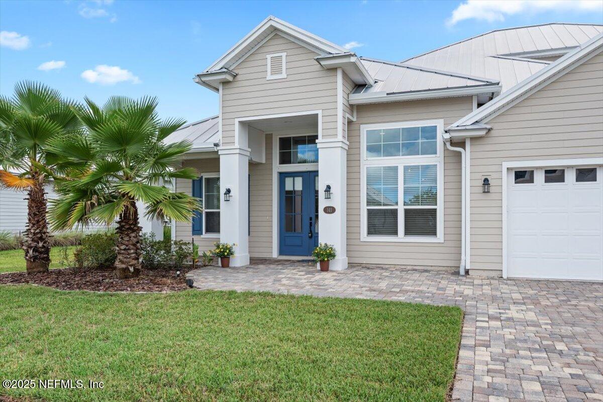 141 Topside Dr. St. Johns, FL 32259 - Photo 5 of 71 a front view of a house with a yard
