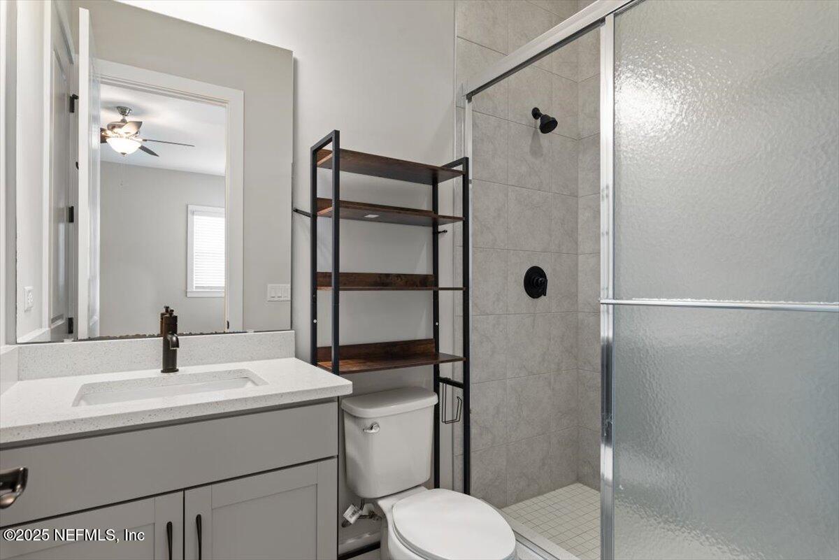 141 Topside Dr. St. Johns, FL 32259 - Photo 51 of 71 a bathroom with a sink toilet and shower