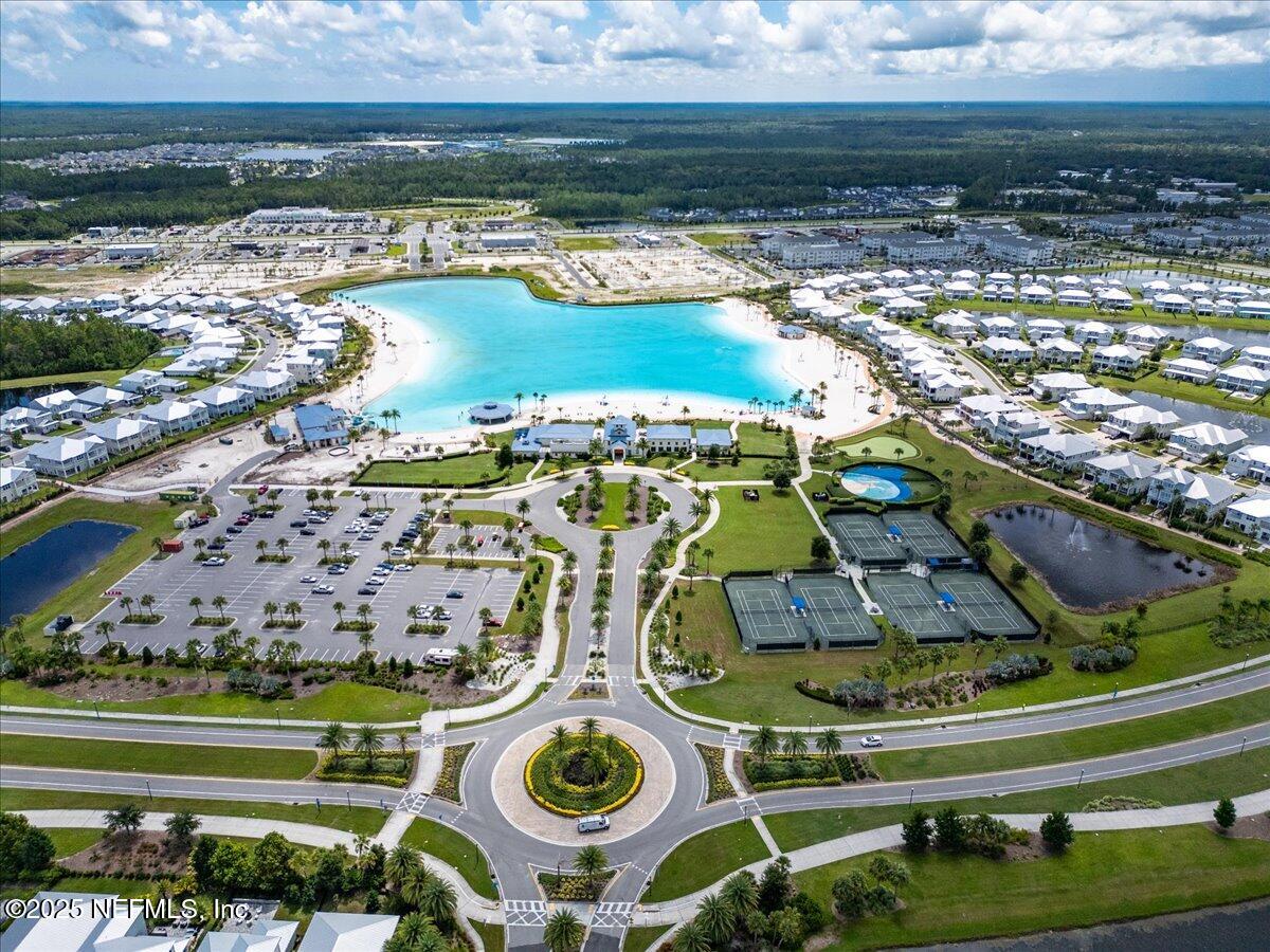 141 Topside Dr. St. Johns, FL 32259 - Photo 62 of 71 a view of swimming pool with a garden and outdoor seating