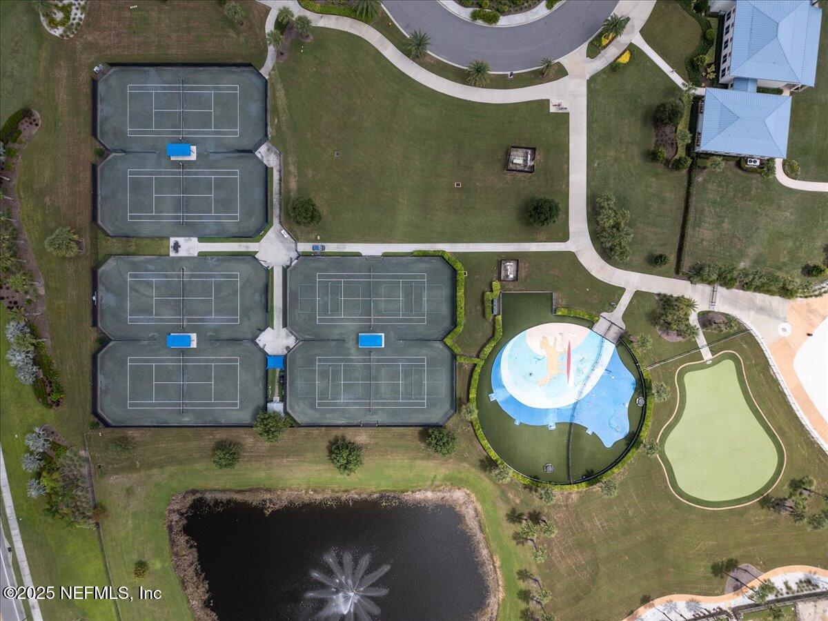 141 Topside Dr. St. Johns, FL 32259 - Photo 63 of 71 an aerial view of a house with swimming pool and porch