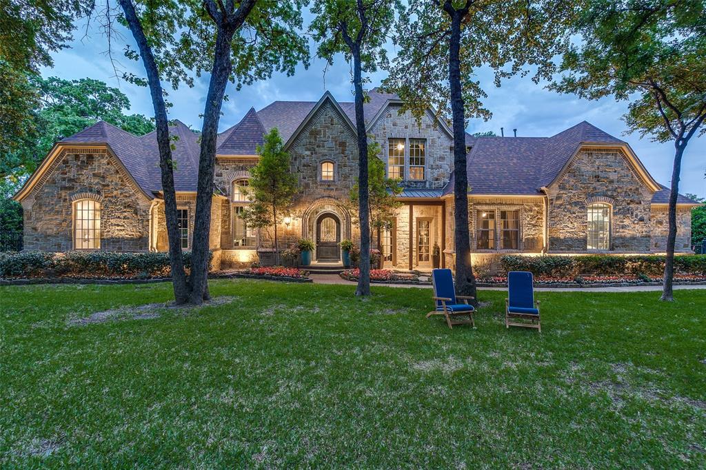 405 King Ranch Road Southlake, TX 76092 - Photo 1 of 1 a front view of a house with garden