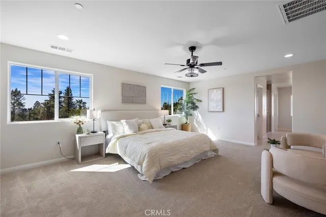 a sign board with a play ground in the back yard