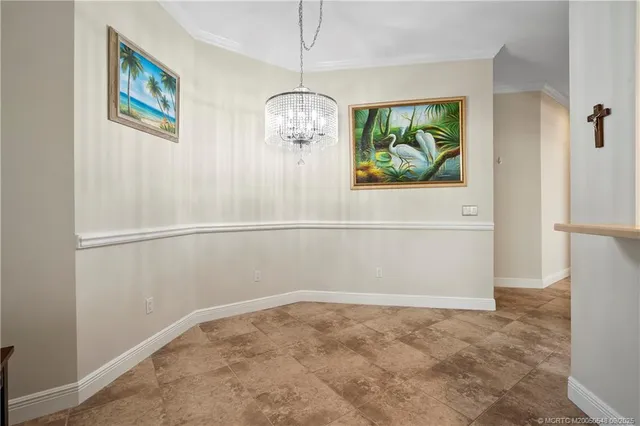 a bathroom with a bathtub a sink a vanity and a mirror