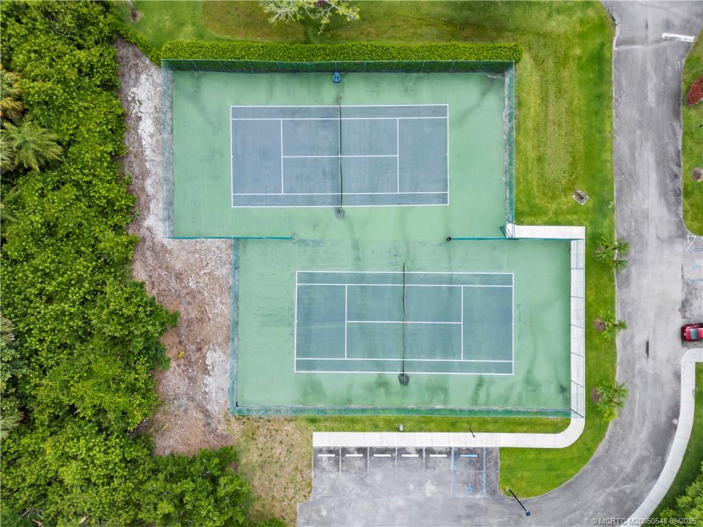 2194 Northwest Tilia Trail Stuart, FL 34994 - Photo 32 of 39 a front view of a house