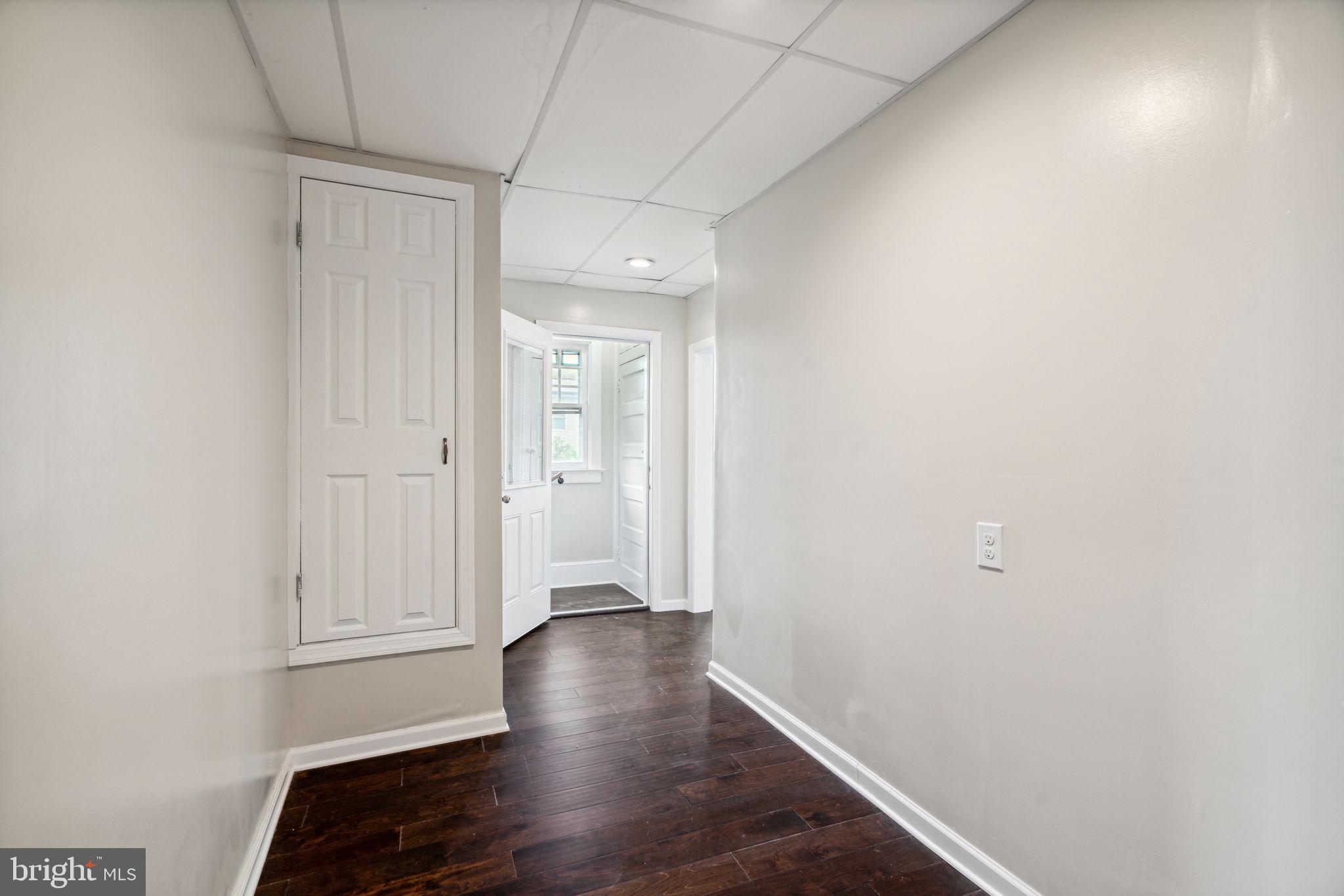 231 West Mill Road Maple Shade, NJ 08052 - Photo 34 of 59 a view of a hallway with wooden floor