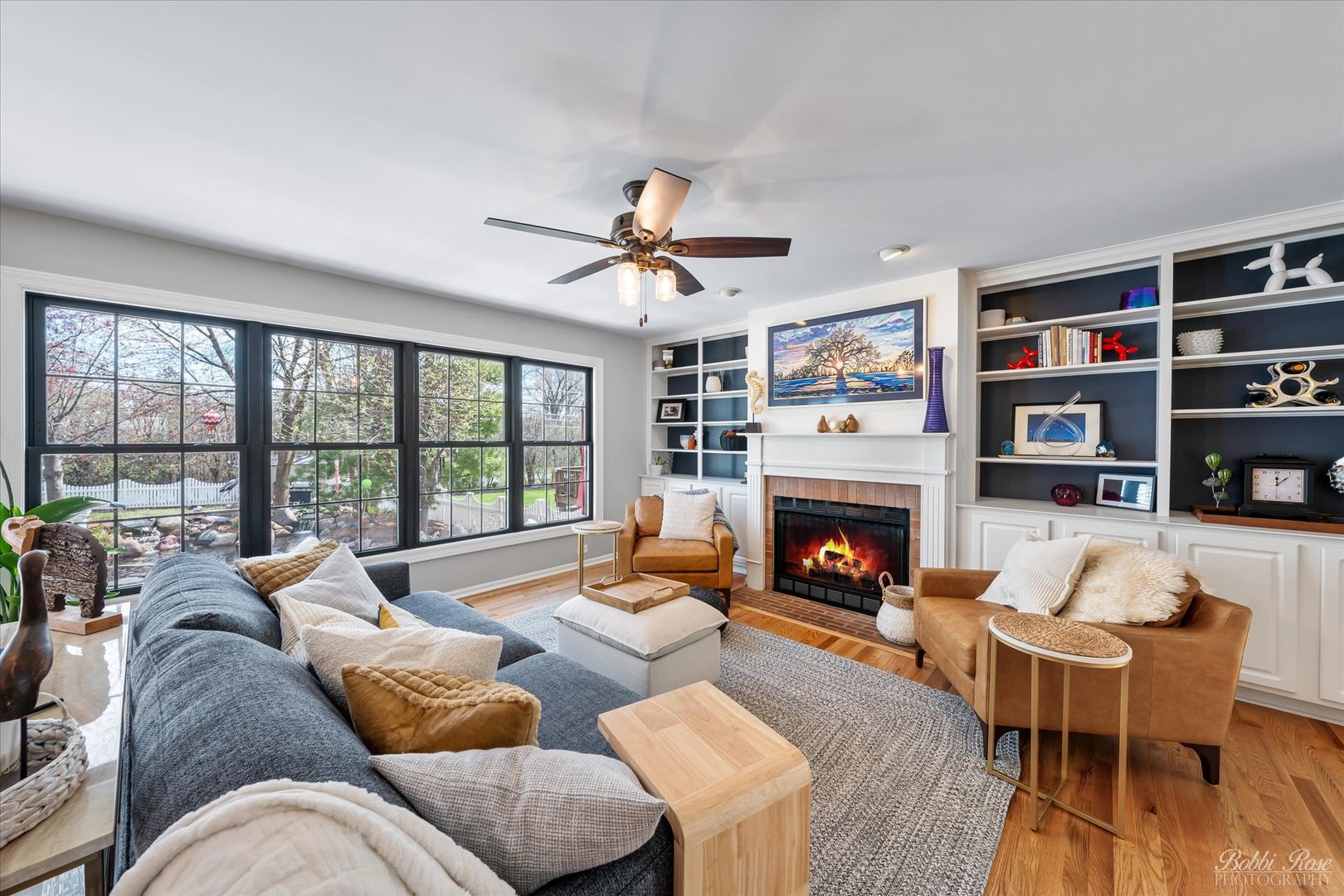 439 South Church Road Bensenville, IL 60106 - Photo 12 of 49 a living room with furniture fireplace and a large window
