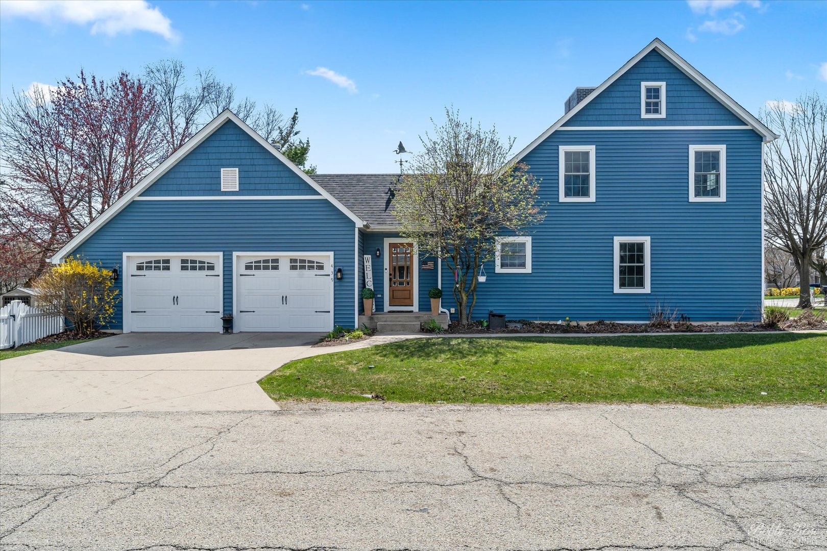 439 South Church Road Bensenville, IL 60106 - Photo 2 of 49 a front view of a house with a yard and garage