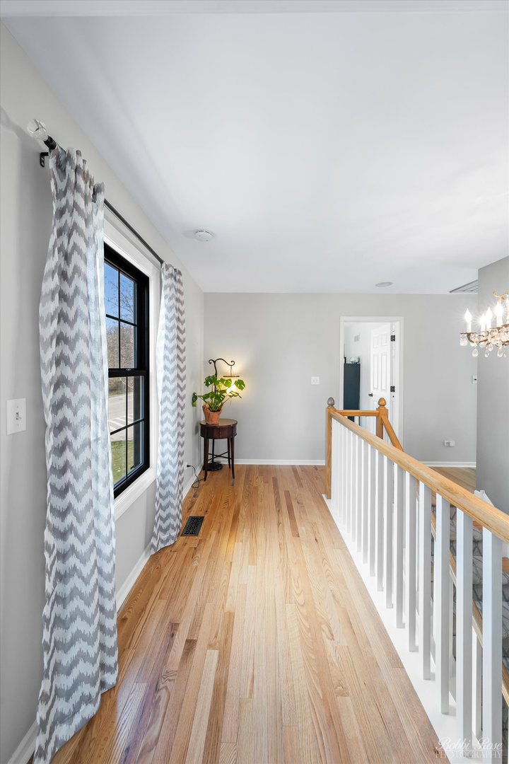 439 South Church Road Bensenville, IL 60106 - Photo 22 of 49 a view of livingroom with furniture and wooden floor