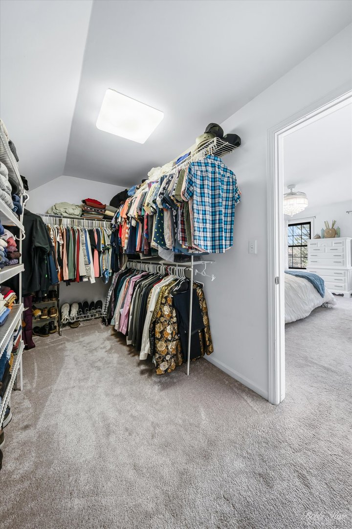 439 South Church Road Bensenville, IL 60106 - Photo 27 of 49 walk in closet with clothes and shoes