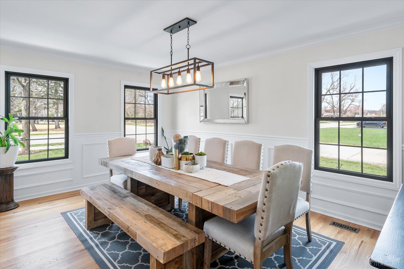 439 South Church Road Bensenville, IL 60106 - Photo 5 of 49 a dining room with furniture a chandelier and wooden floor