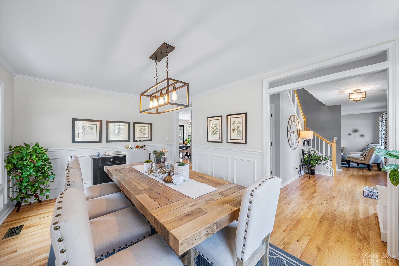 439 South Church Road Bensenville, IL 60106 - Photo 6 of 49 a view of a dining room with furniture a chandelier and wooden floor