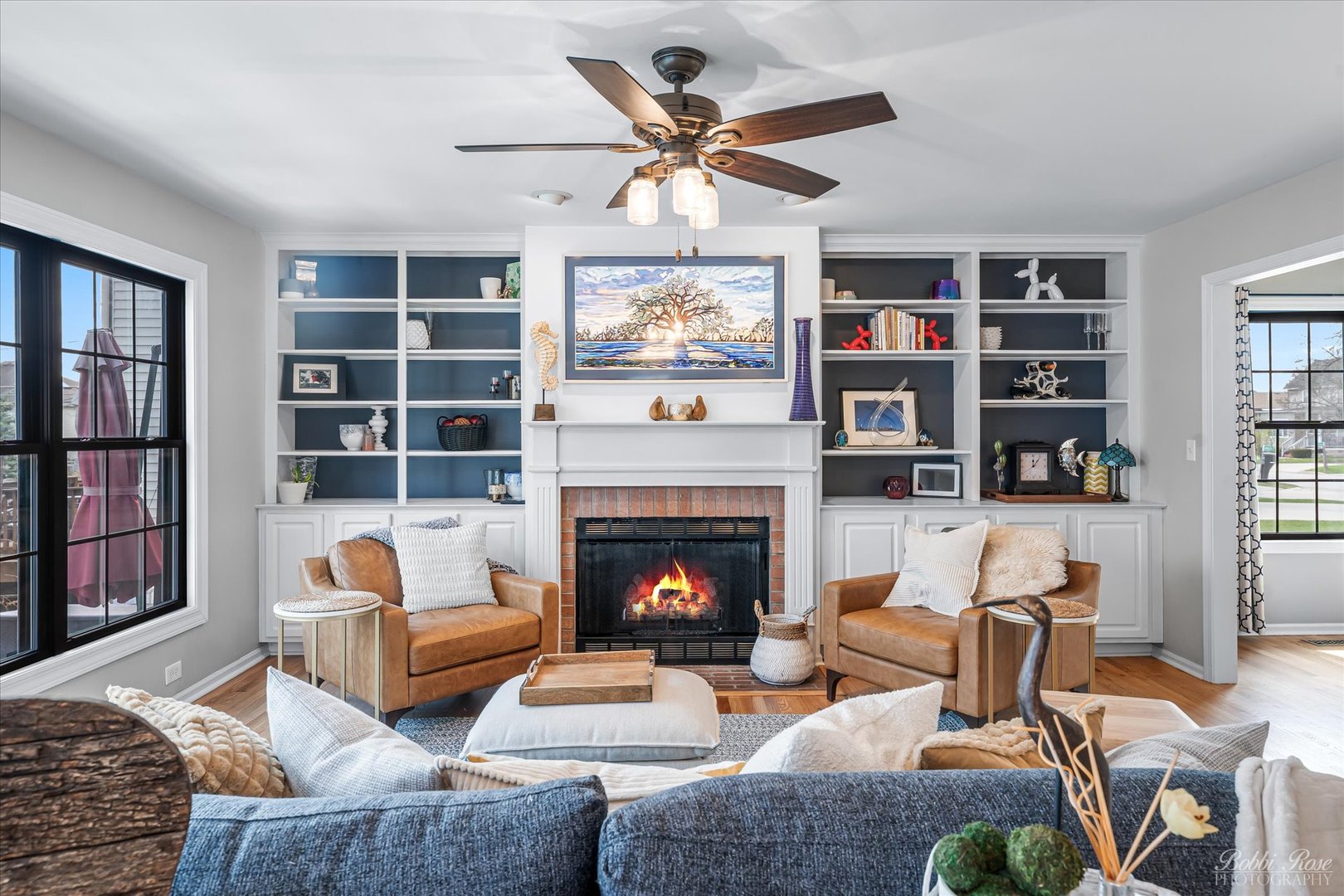 439 South Church Road Bensenville, IL 60106 - Photo 7 of 49 a living room with furniture fireplace and book shelf