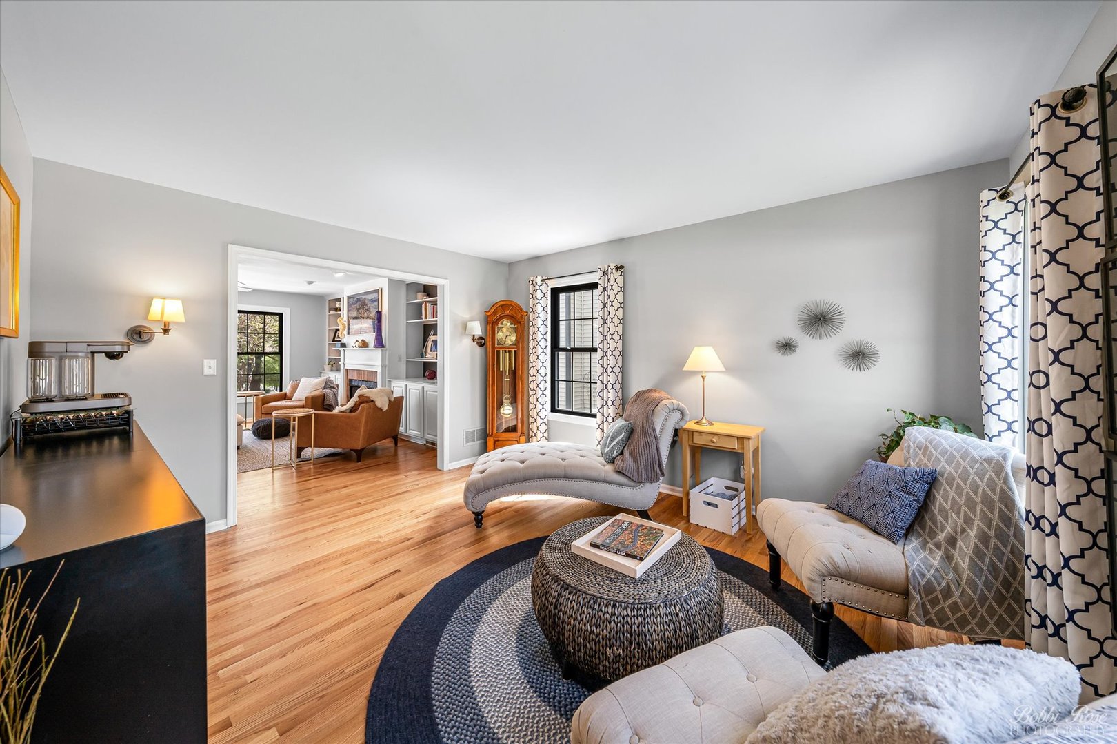 439 South Church Road Bensenville, IL 60106 - Photo 8 of 49 a living room with furniture a lamp wooden floor and a large window