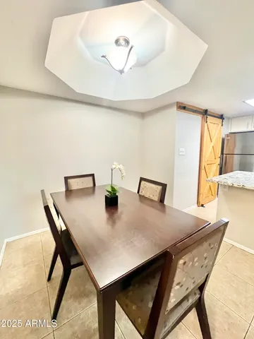 a view of a dining room with furniture