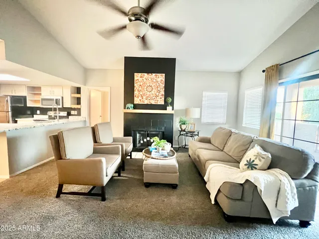 a living room with furniture and a window