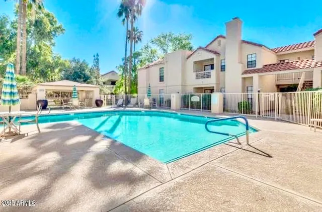 a view of a house with a swimming pool