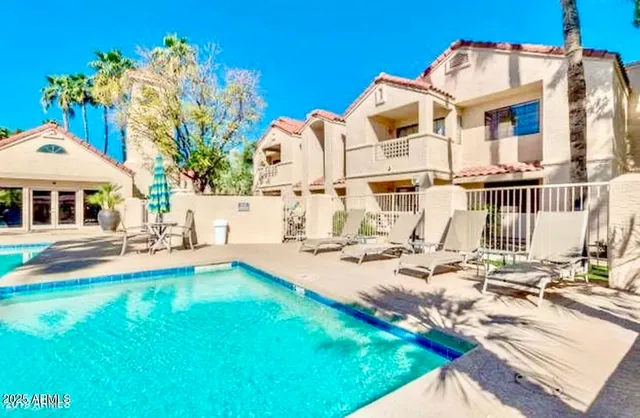a view of a house with backyard porch and patio