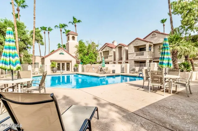 a view of house with outdoor space and sitting area