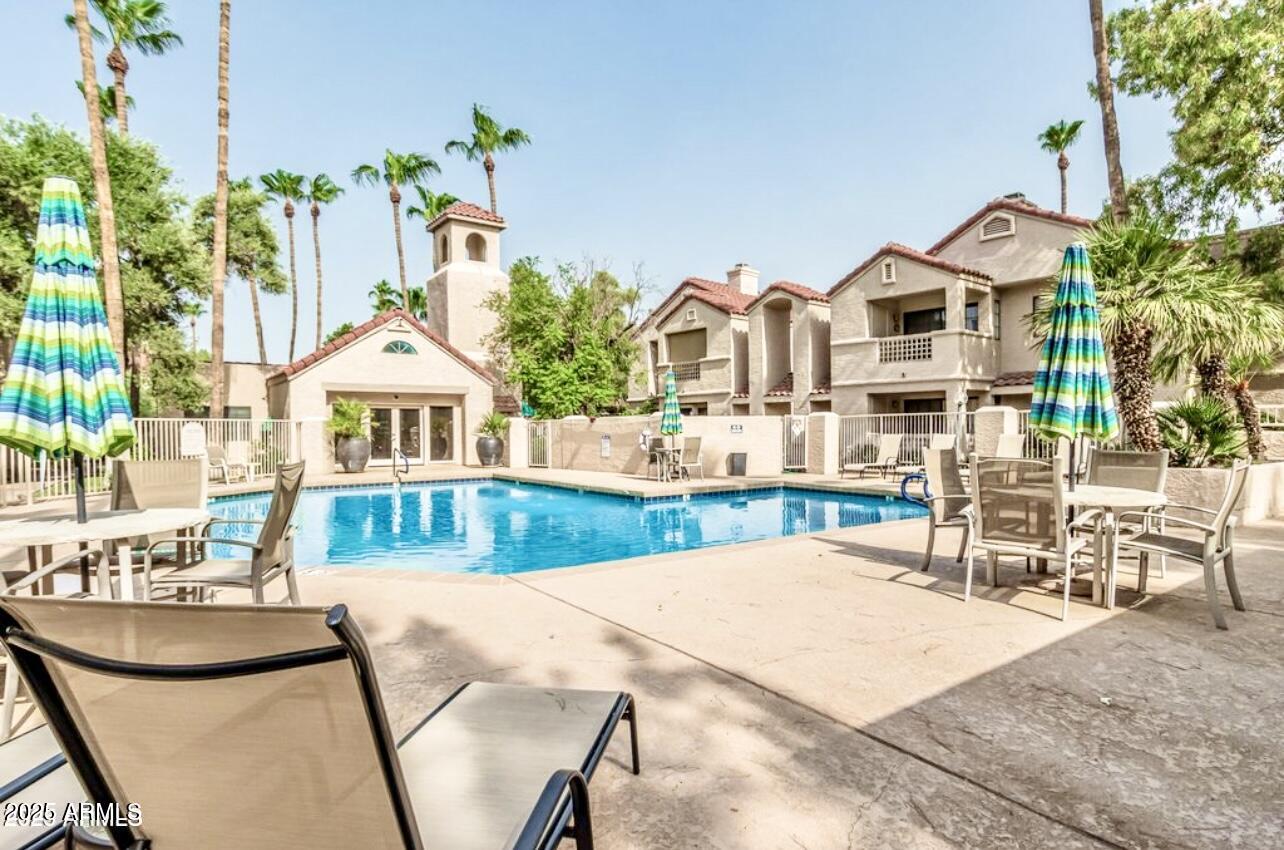 2855 South Ext Road, Unit 220 Mesa, AZ 85210 - Photo 38 of 40 a view of house with outdoor space and sitting area