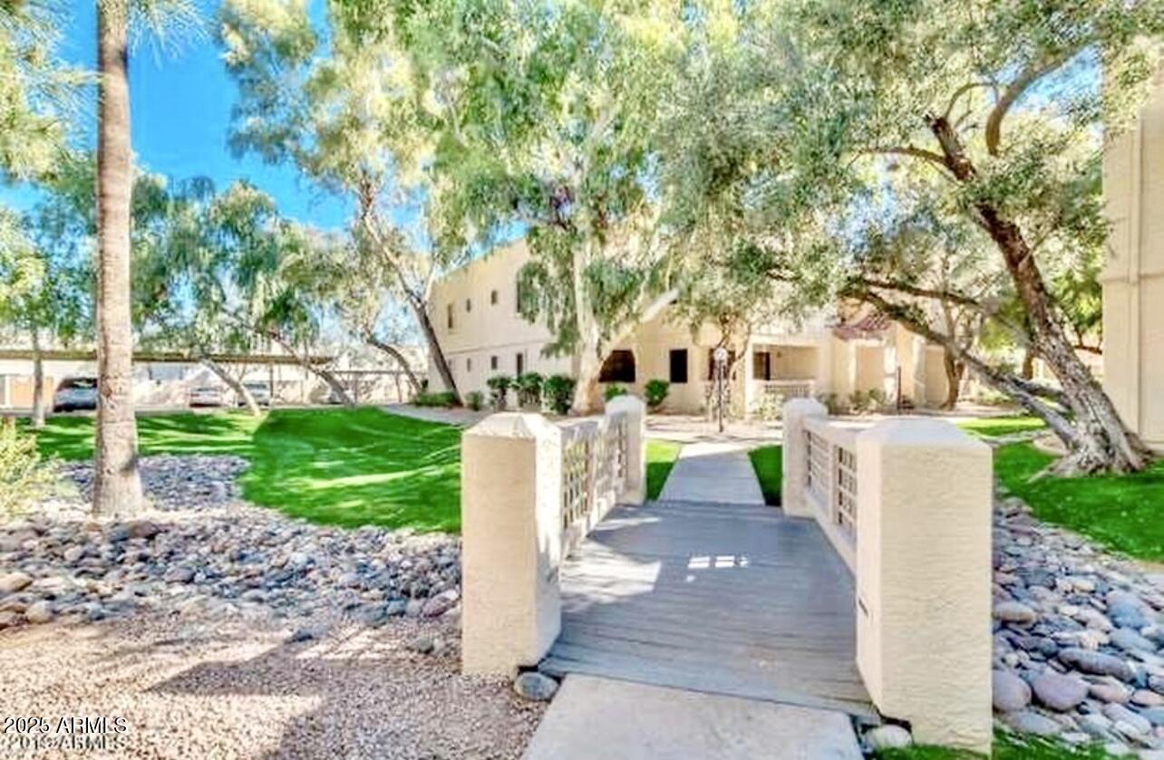 2855 South Ext Road, Unit 220 Mesa, AZ 85210 - Photo 40 of 40 a view of a park with large trees