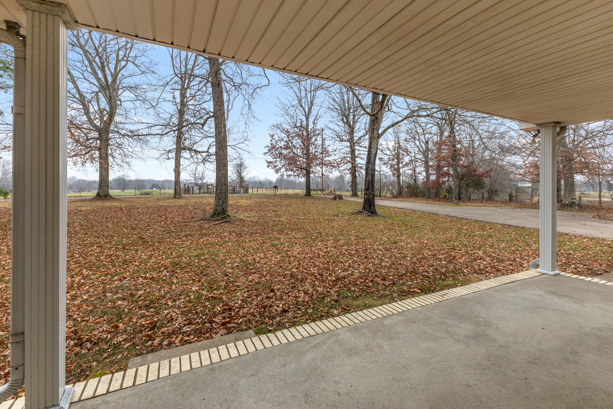 698 Houston Fielder Road Clarksville, TN 37043 - Photo 12 of 61 a view of empty room with tree s