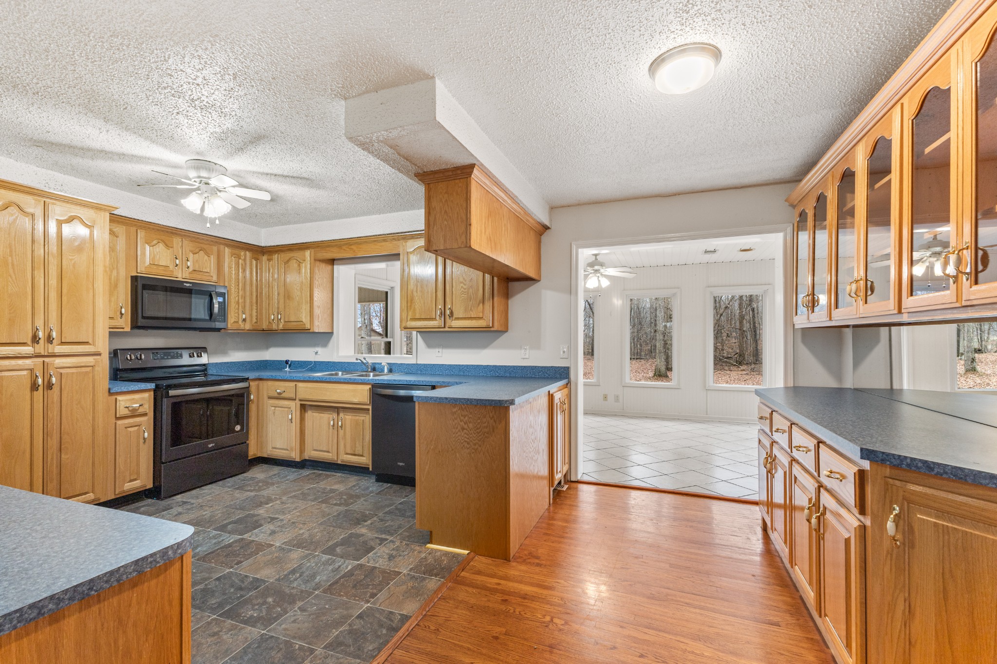 698 Houston Fielder Road Clarksville, TN 37043 - Photo 15 of 61 a kitchen with stainless steel appliances granite countertop a stove a sink and a refrigerator