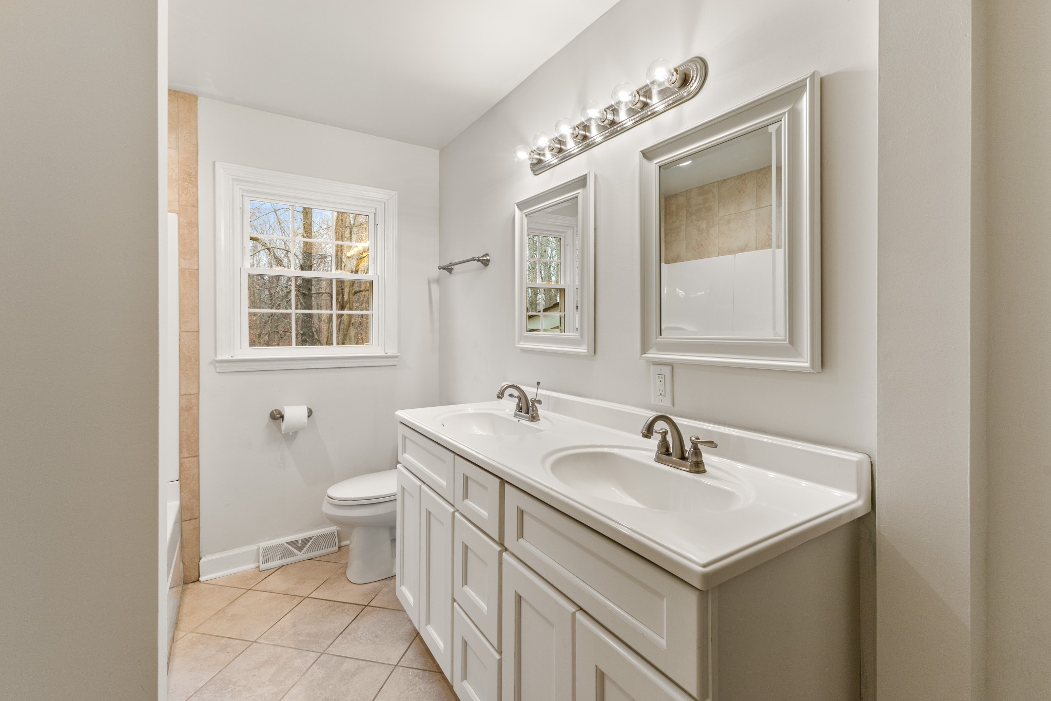 698 Houston Fielder Road Clarksville, TN 37043 - Photo 23 of 61 a bathroom with a sink toilet and shower