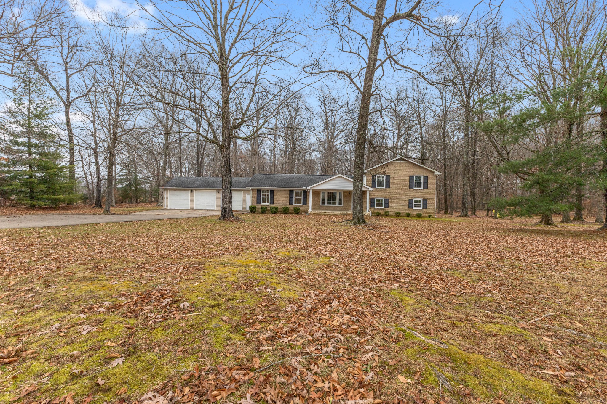 698 Houston Fielder Road Clarksville, TN 37043 - Photo 3 of 61 a front view of a house with garden