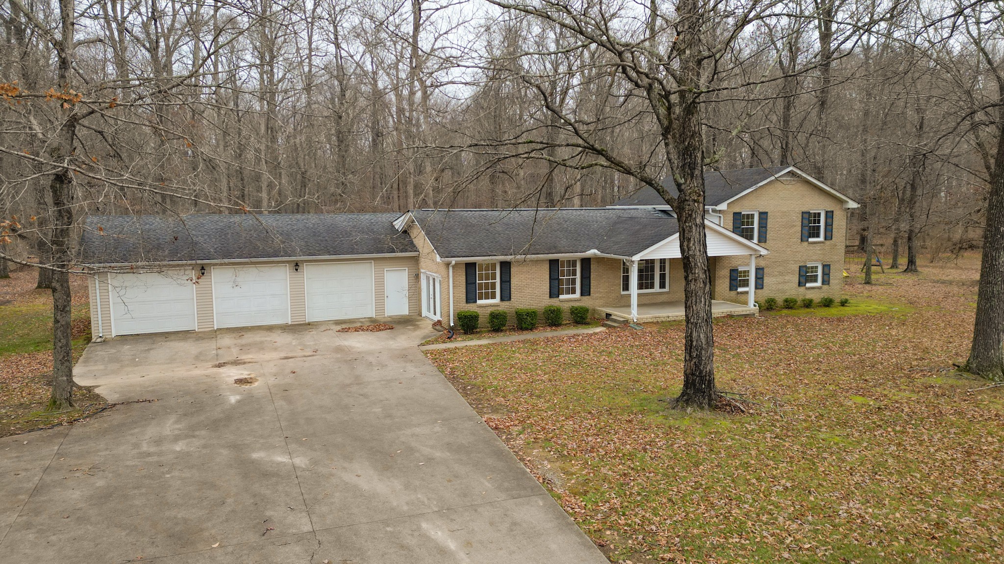 698 Houston Fielder Road Clarksville, TN 37043 - Photo 54 of 61 a front view of a house with a yard and garage