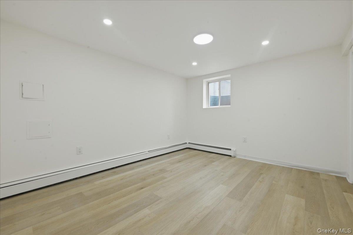 84 North Fordham Road Hicksville, NY 11801 - Photo 21 of 28 a view of an empty room
