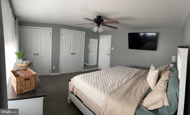 10848 Perrin Road Philadelphia, PA 19154 - Photo 13 of 38 a bedroom with a bed and a chandelier