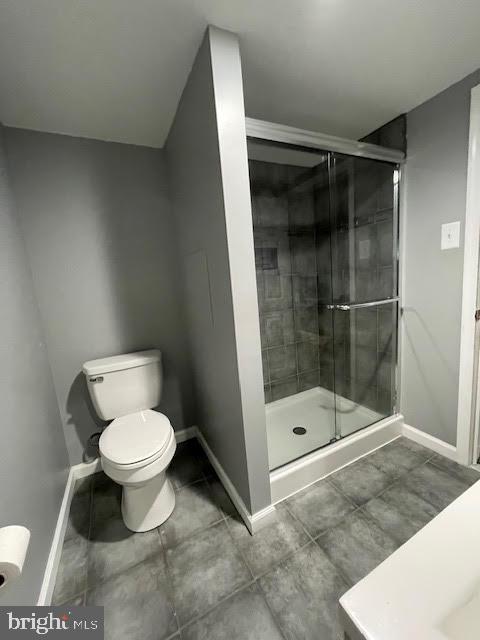 10848 Perrin Road Philadelphia, PA 19154 - Photo 26 of 38 a bathroom with a toilet and a shower