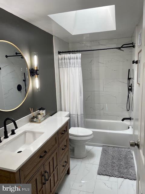 10848 Perrin Road Philadelphia, PA 19154 - Photo 10 of 38 a bathroom with a tub sink toilet and a mirror