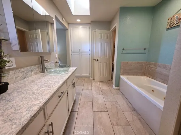 a view of a garden with a house