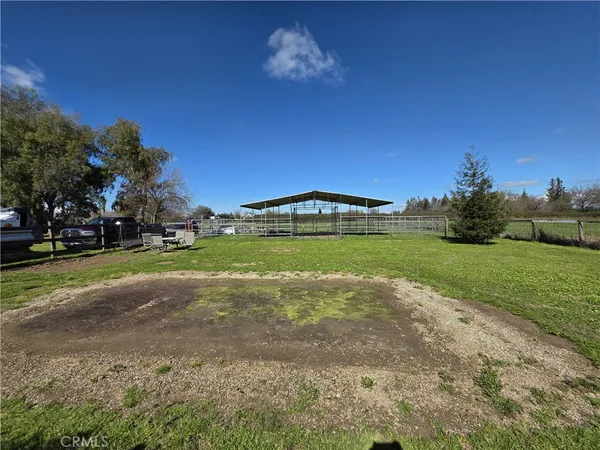 a view of a golf course with a lake