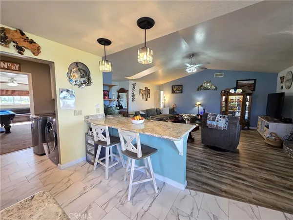 a view of a dining room and livingroom