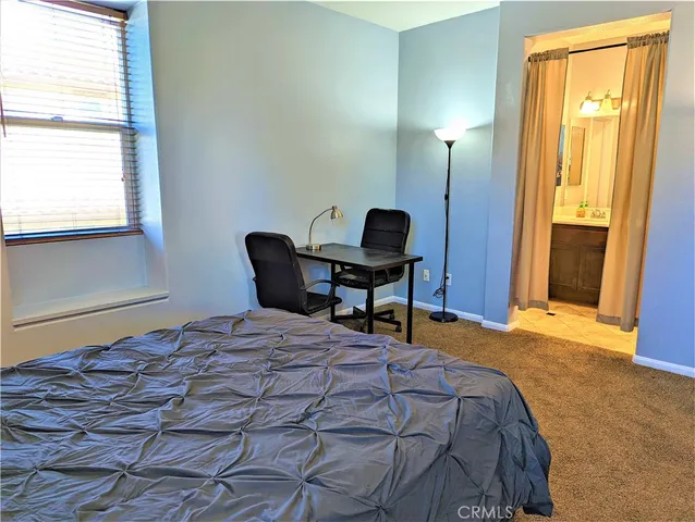 a room with a chair and a table