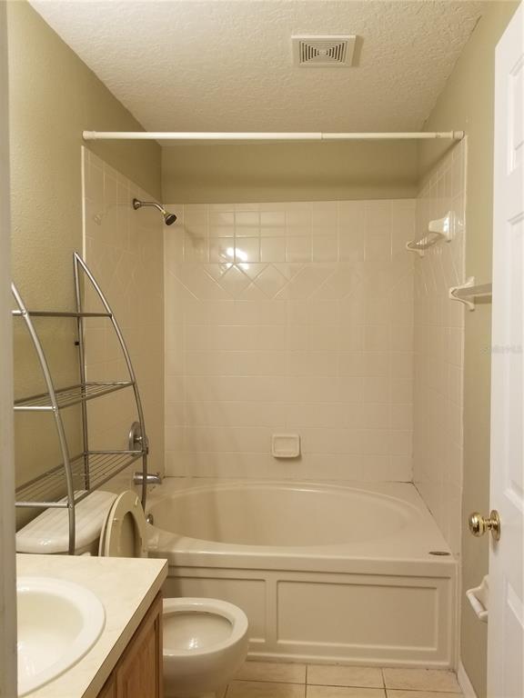 219 Drawbridge Lane Valrico, FL 33594 - Photo 17 of 24 a bathroom with a sink and a shower