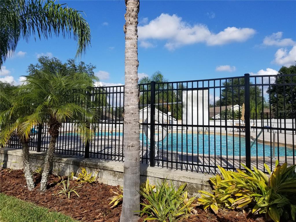 219 Drawbridge Lane Valrico, FL 33594 - Photo 23 of 24 a view of a balcony with a garden