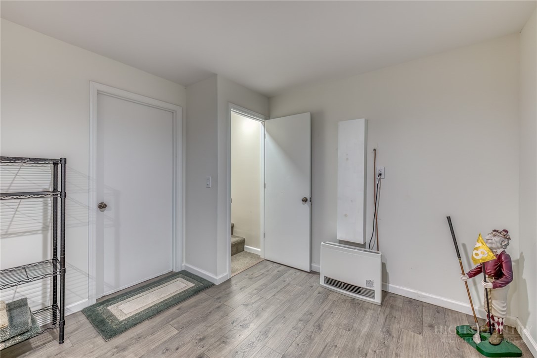 174 Spruce Pine Road Newland, NC 28657 - Photo 23 of 50 a view of an empty room and wooden floor