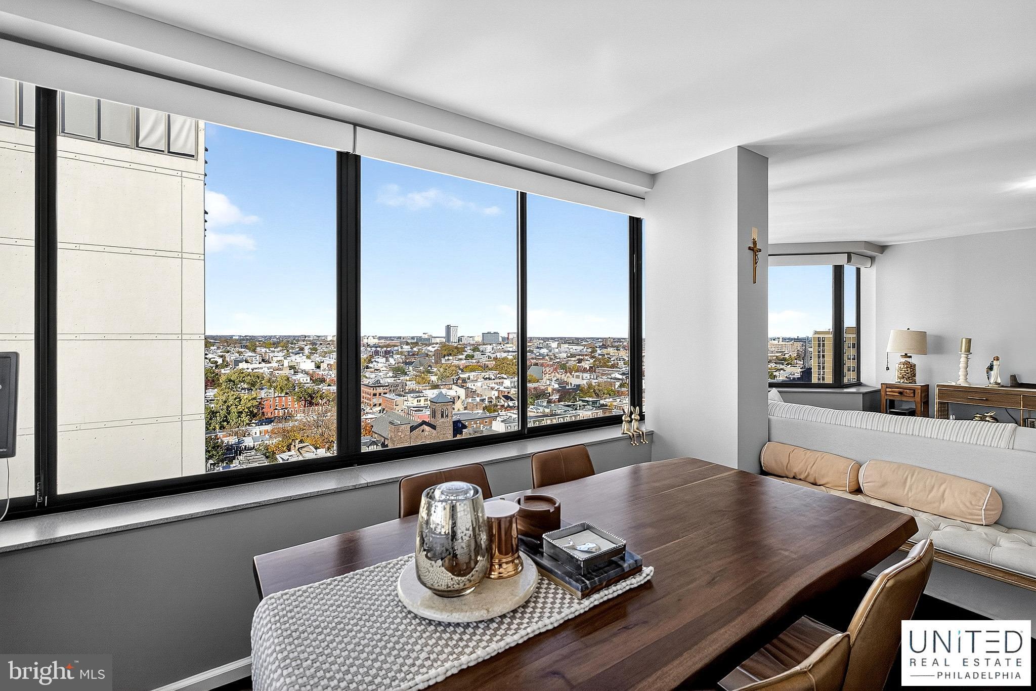 2001 Hamilton Street, Unit 2001 Philadelphia, PA 19130 - Photo 17 of 46 a living room with furniture and a window
