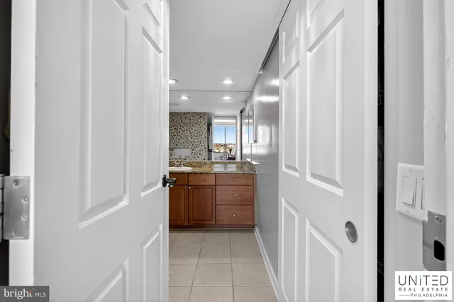 a bathroom with a sink and mirror