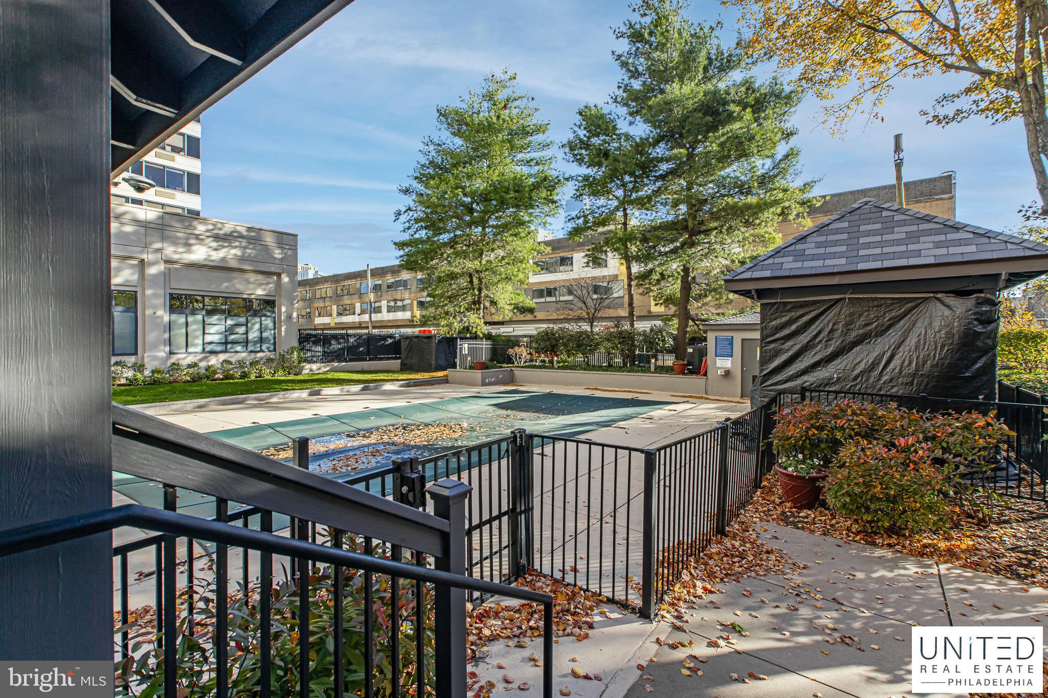 2001 Hamilton Street, Unit 2001 Philadelphia, PA 19130 - Photo 41 of 46 a view of balcony with wooden floor and outdoor seating